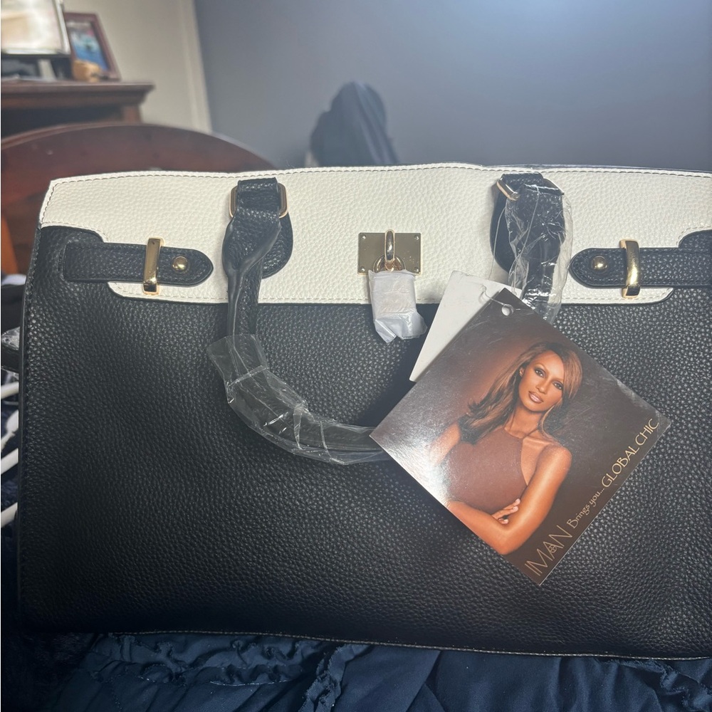 Black and white handbag with shoulder strap